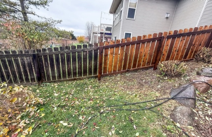 Fence power washing before and after